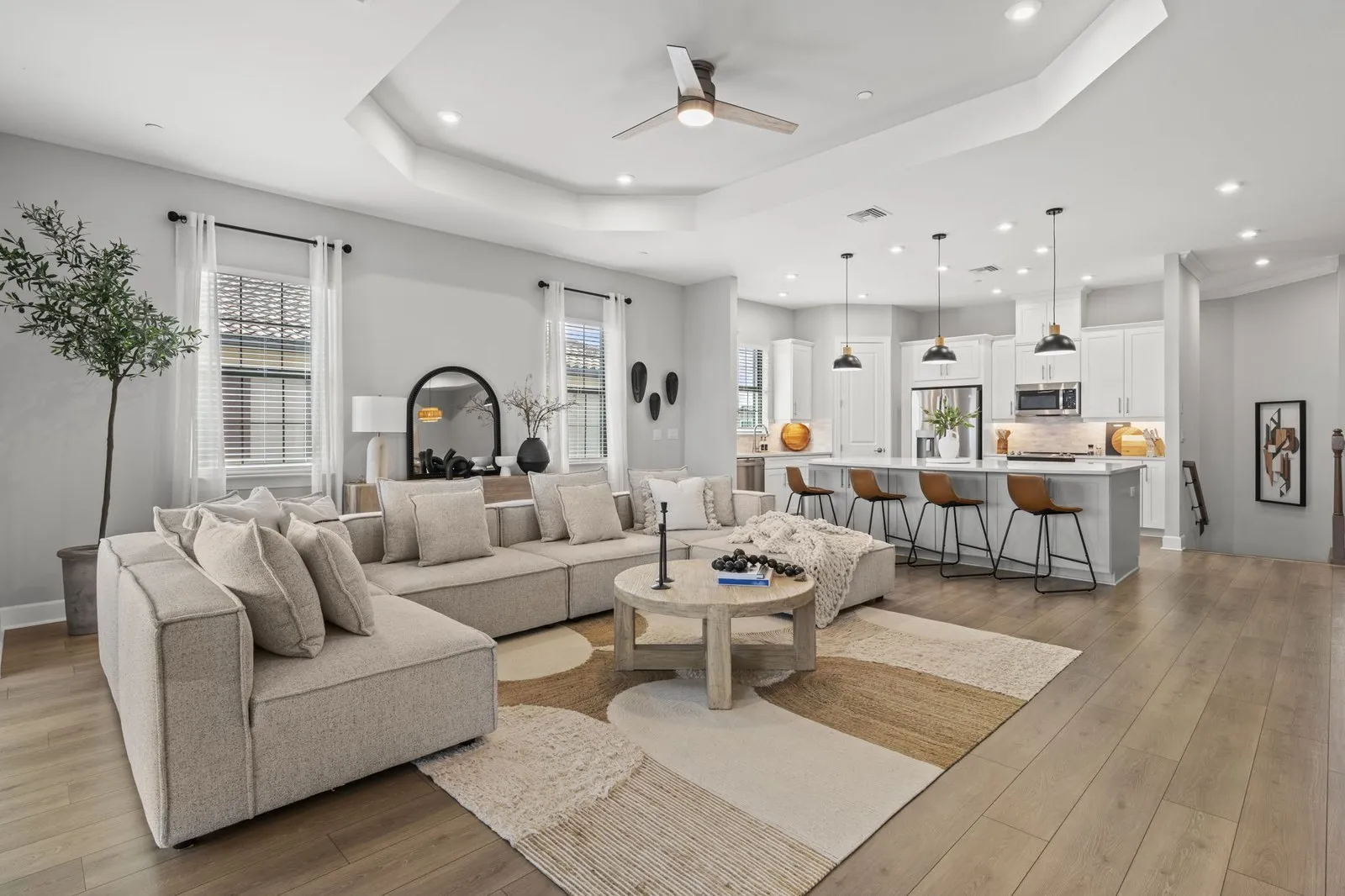Open family room connected to the kitchen and dining area