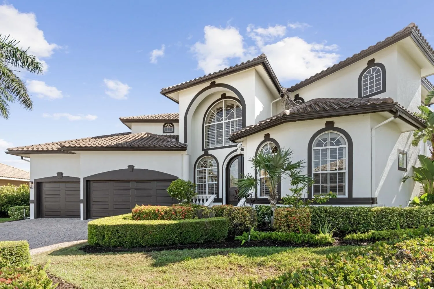 Mediterranean-style home exterior on a sunny day