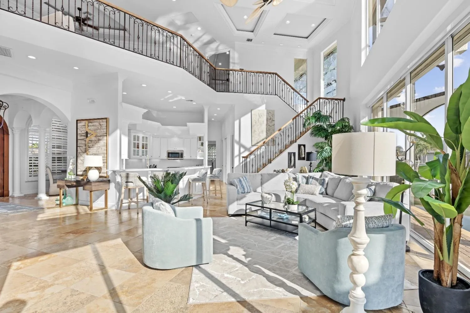 Two-story living room with an interior balcony
