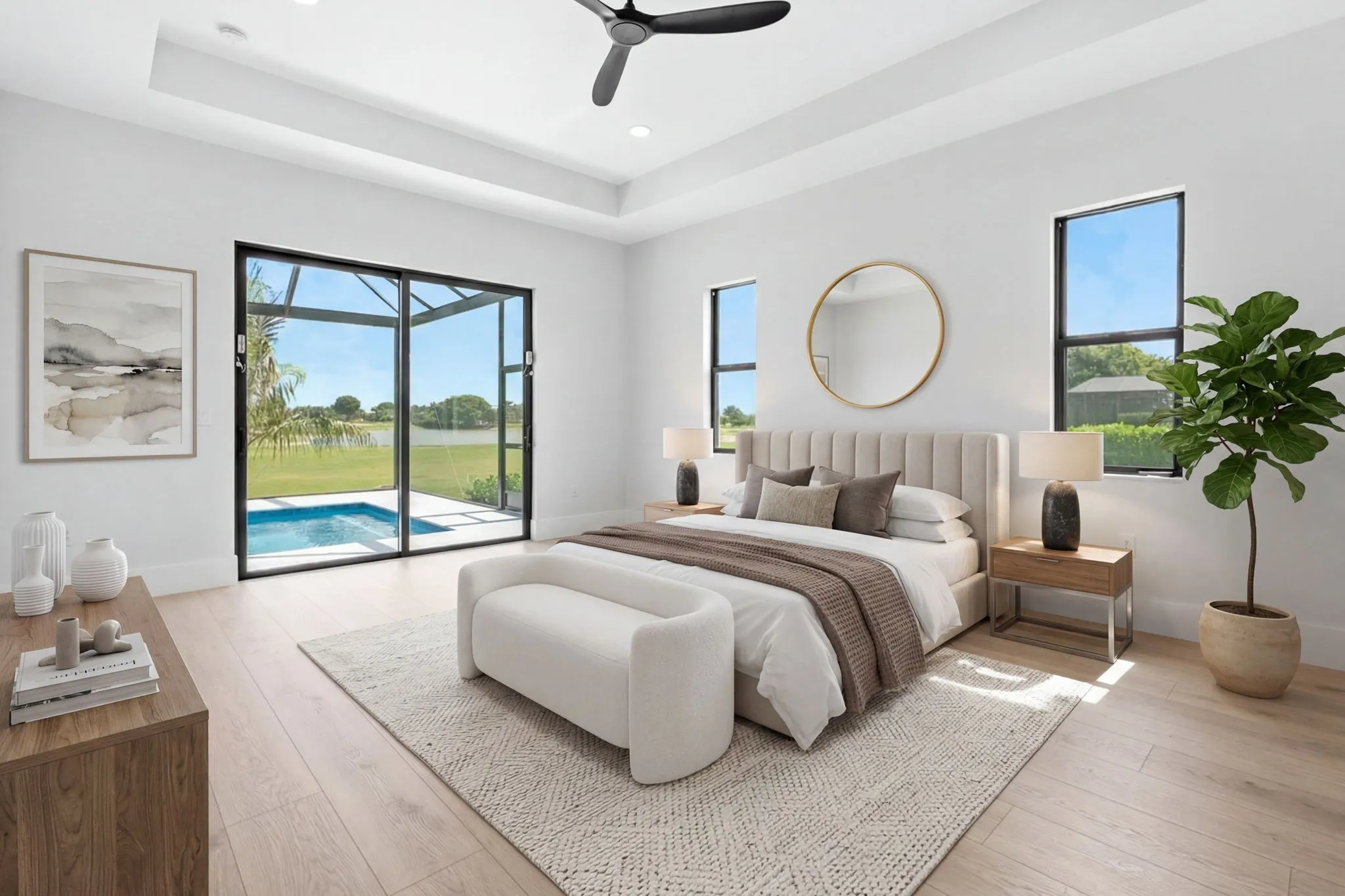The same bedroom virtually staged with an upholstered bed and a rug